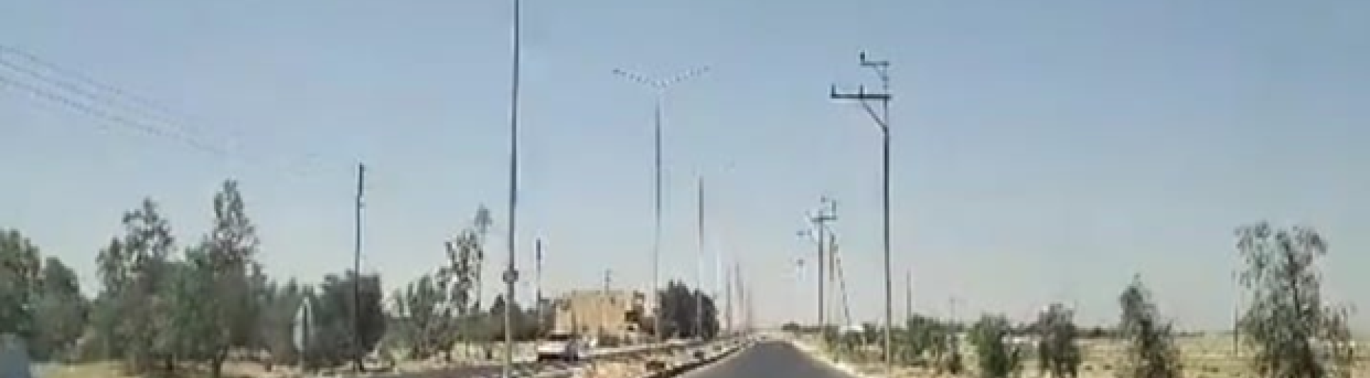 فتح وتعبيد وخلطة أسفلتيه للمدخل الرئيسي لبلدية أم الجمال